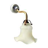 Brass gooseneck wall lamp, with brass socket and porcelain base.