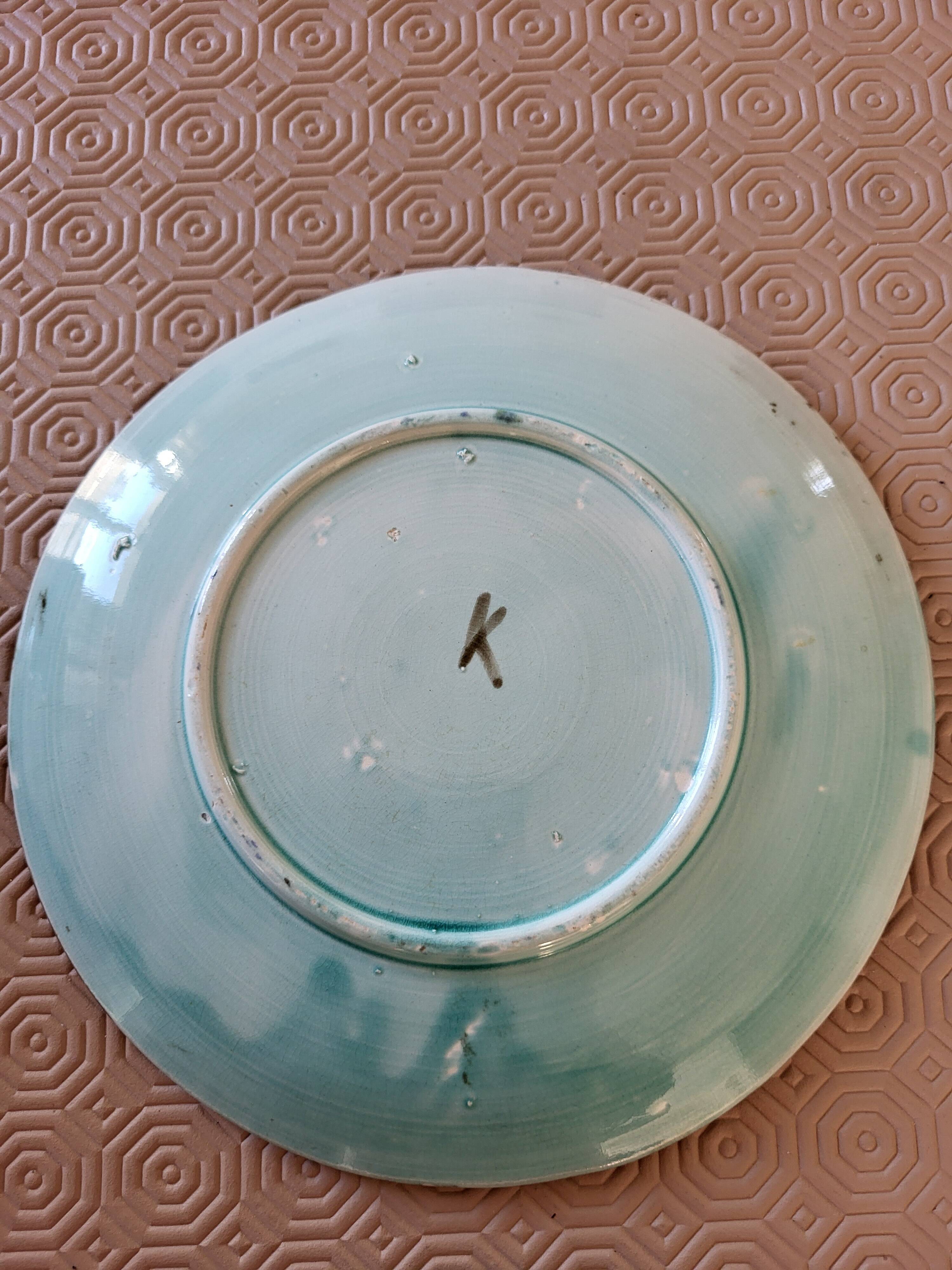 Set of earthenware plates from Wasmüel.