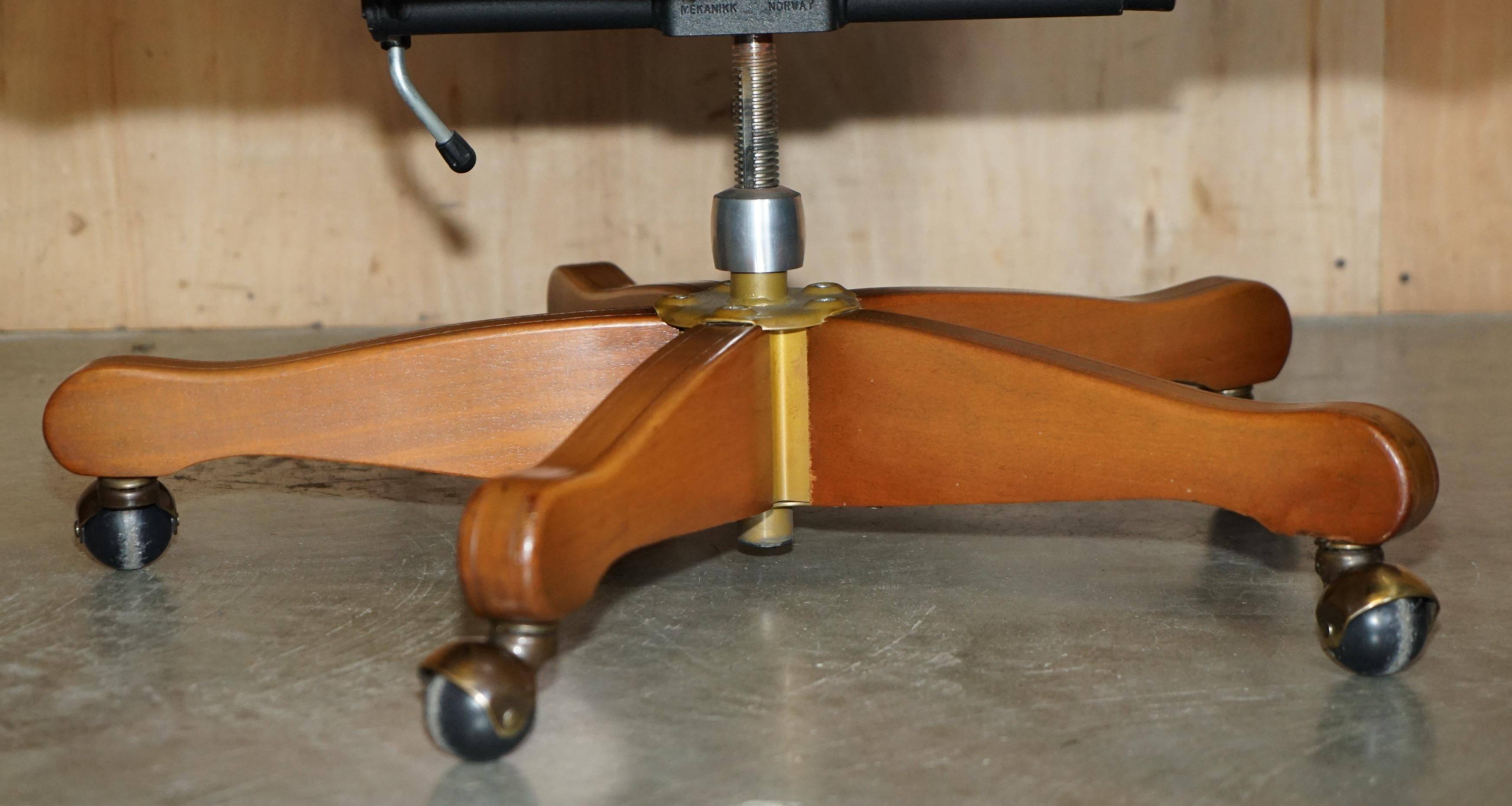 Captain's chair Chesterfield vintage leather with tufted wingback.