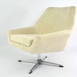 Cream corduroy swivel shell armchairs