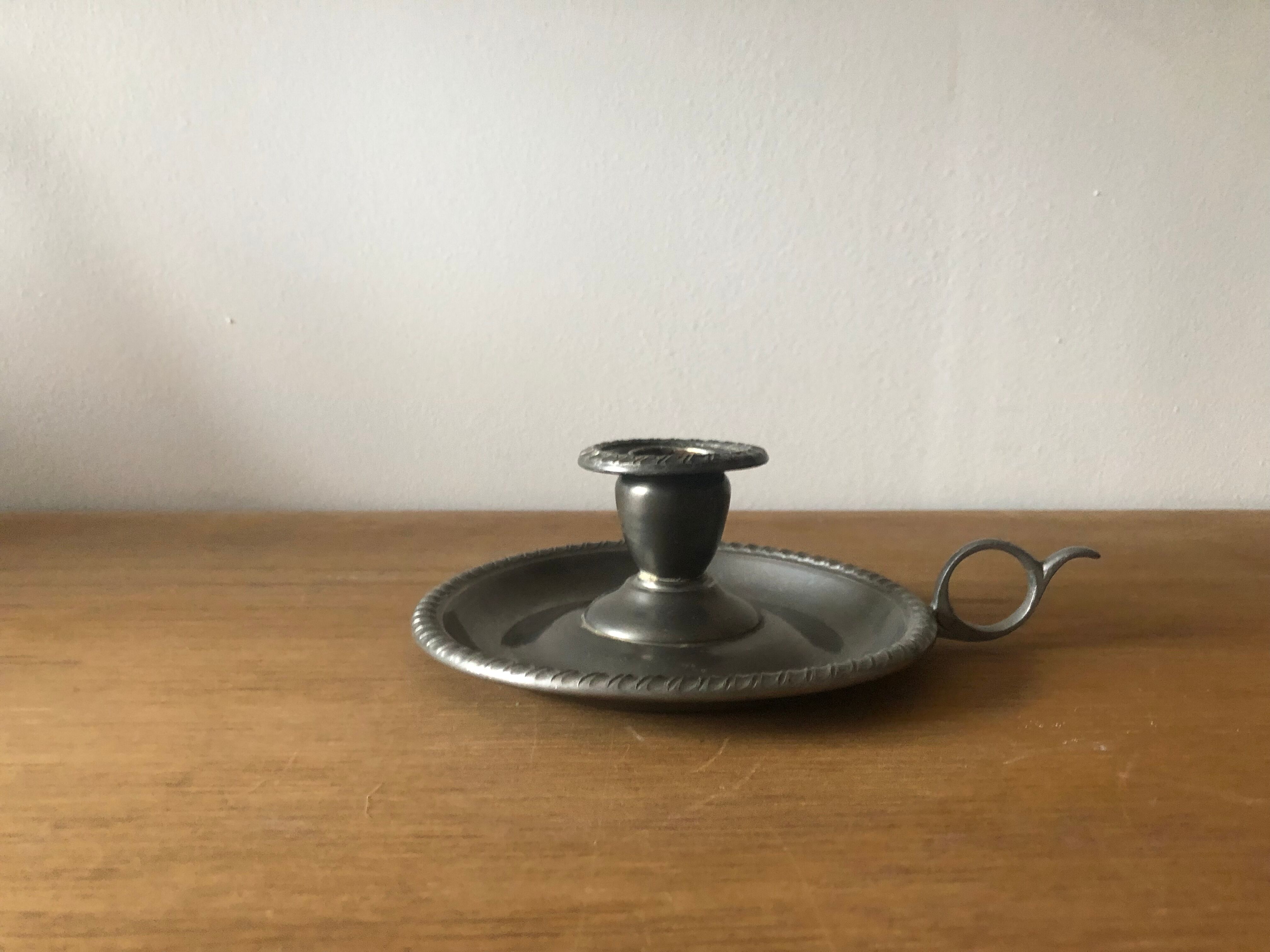 Tin hand candle holder