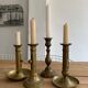 Set 4 vintage brass candlesticks patinated