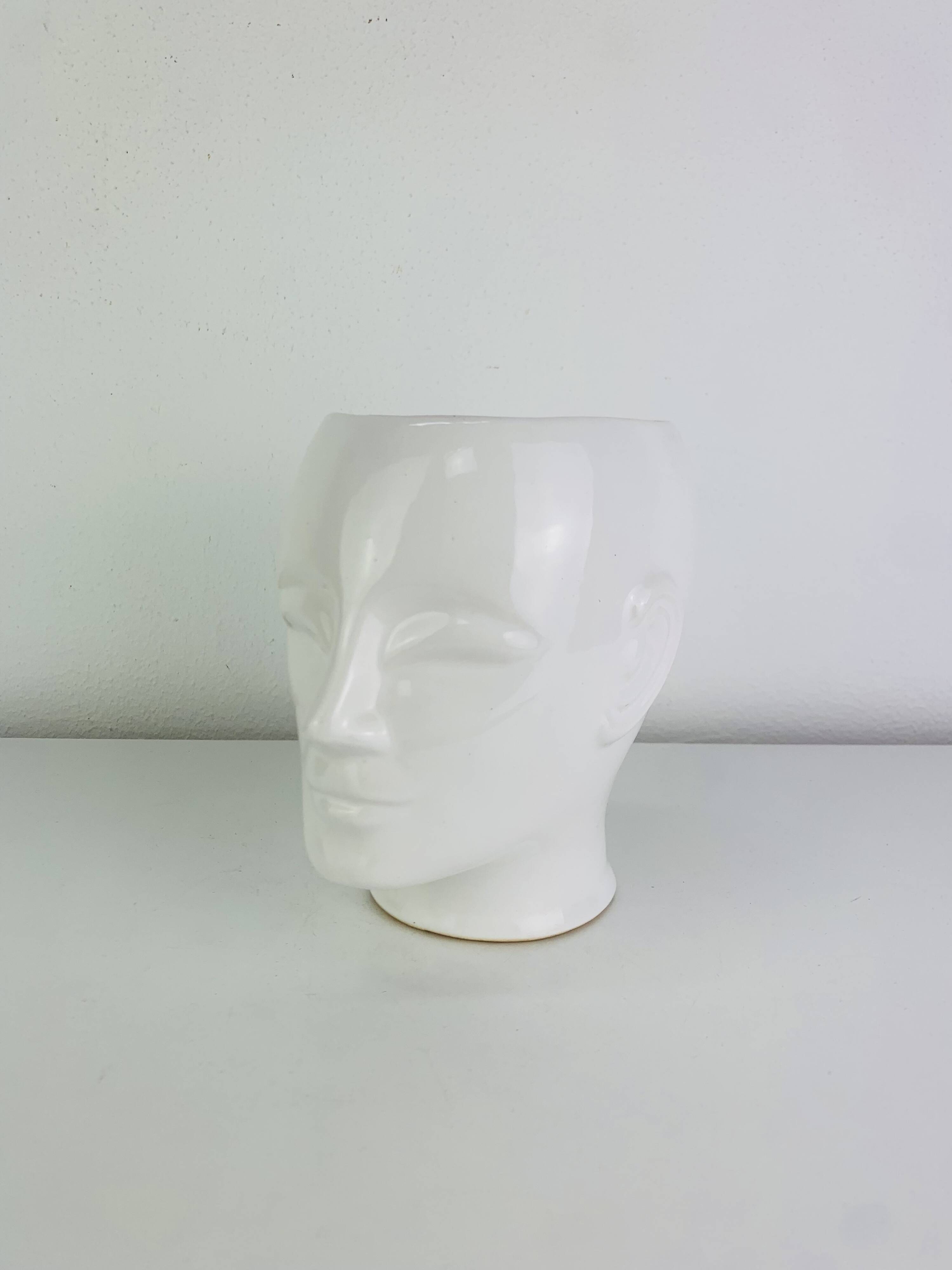 Vintage anthropomorphic ceramic head vase.