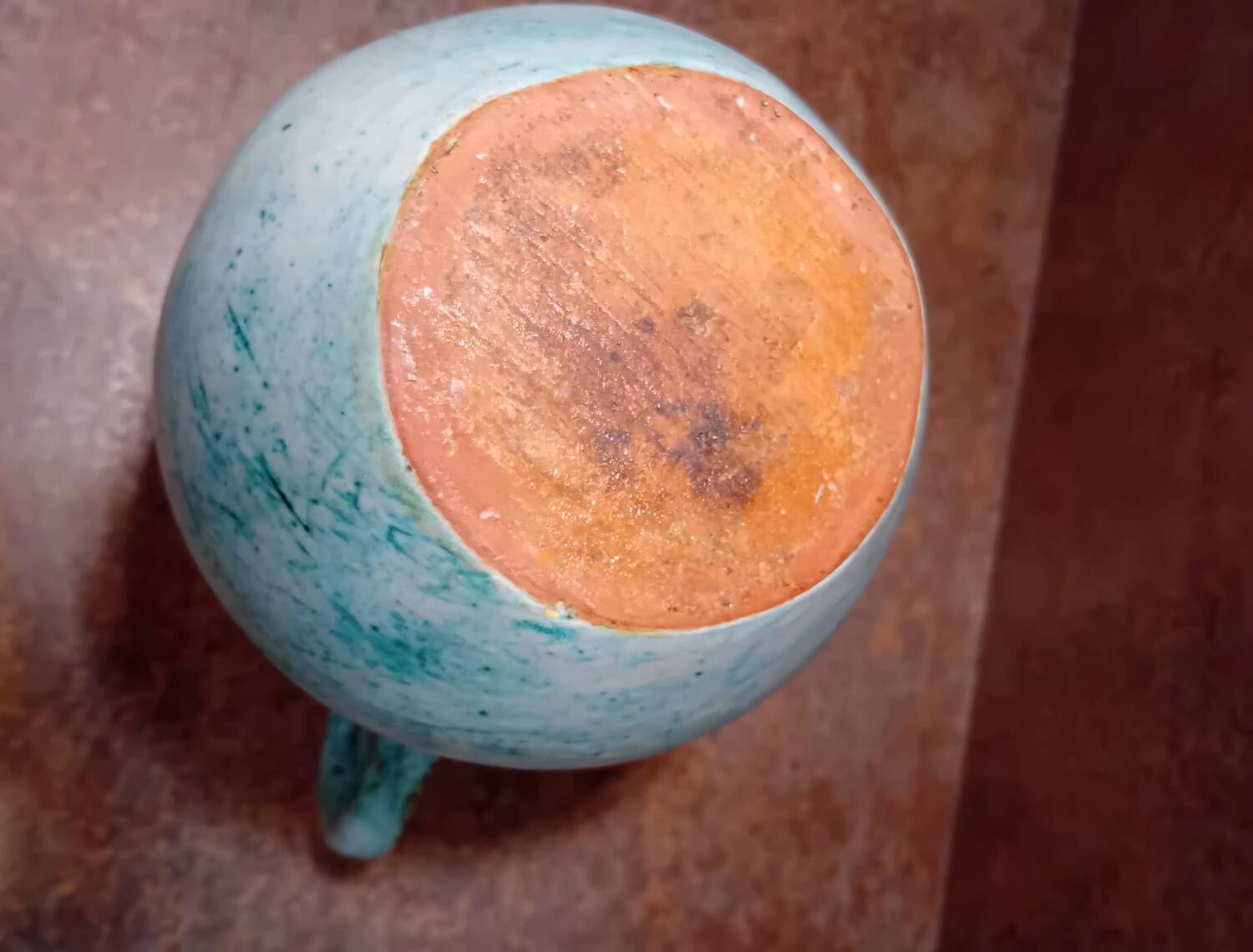 Turquoise ceramic pitcher vase