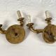 Pair of gilded wooden wall lights with two arms, early 20th century.