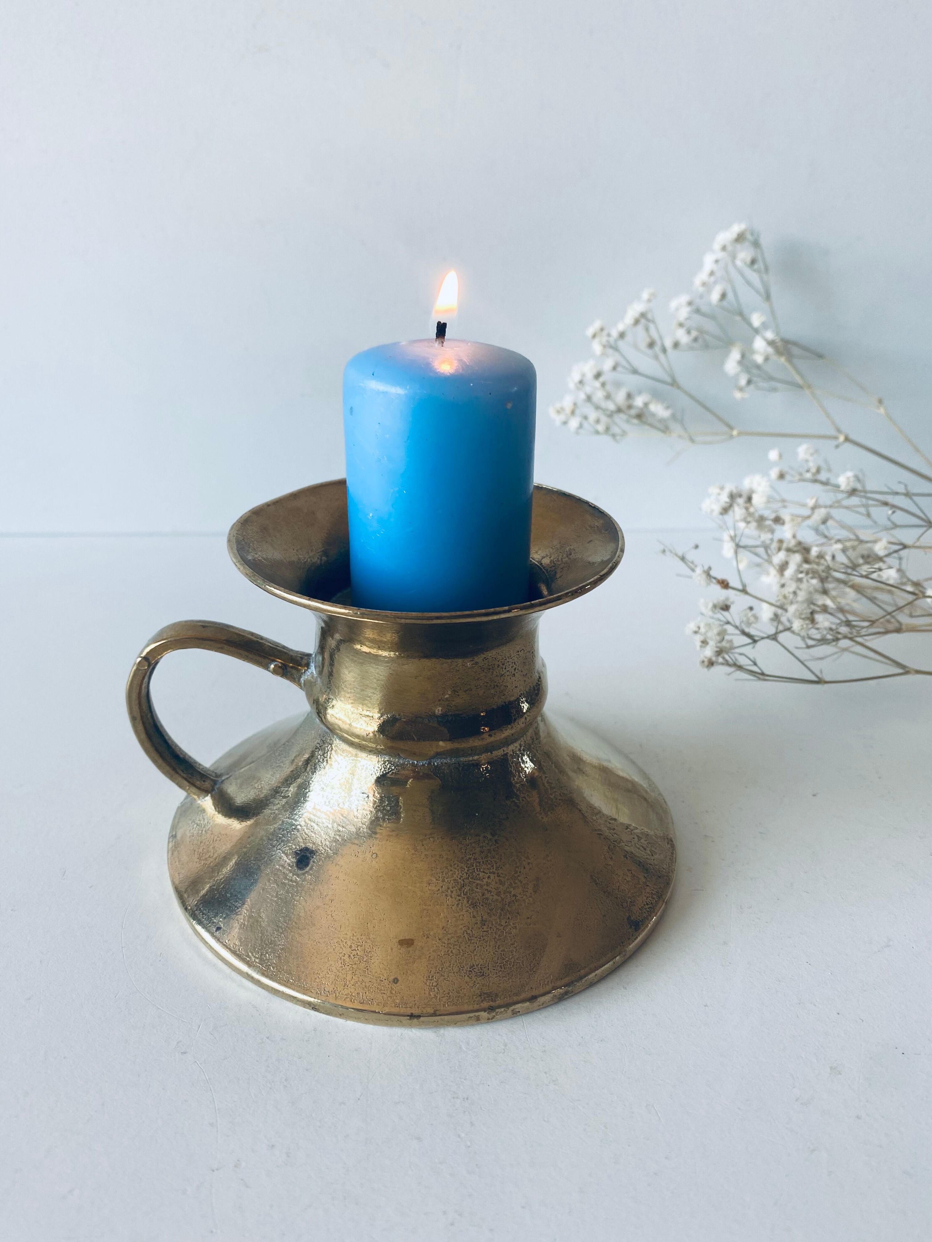 Old bronze church candle holder