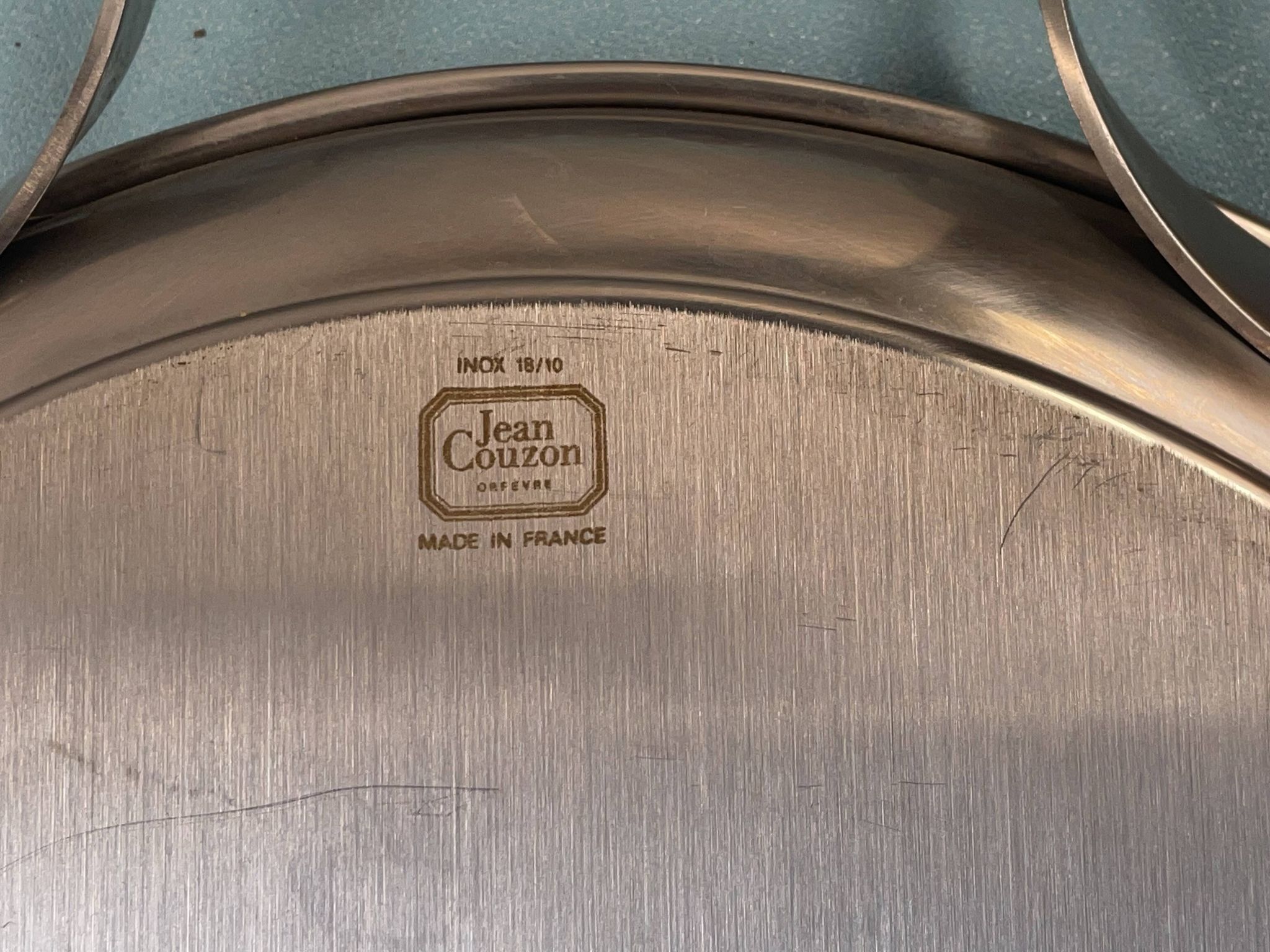 oblong tray in stainless steel and wood by goldsmith Jean Couzon
