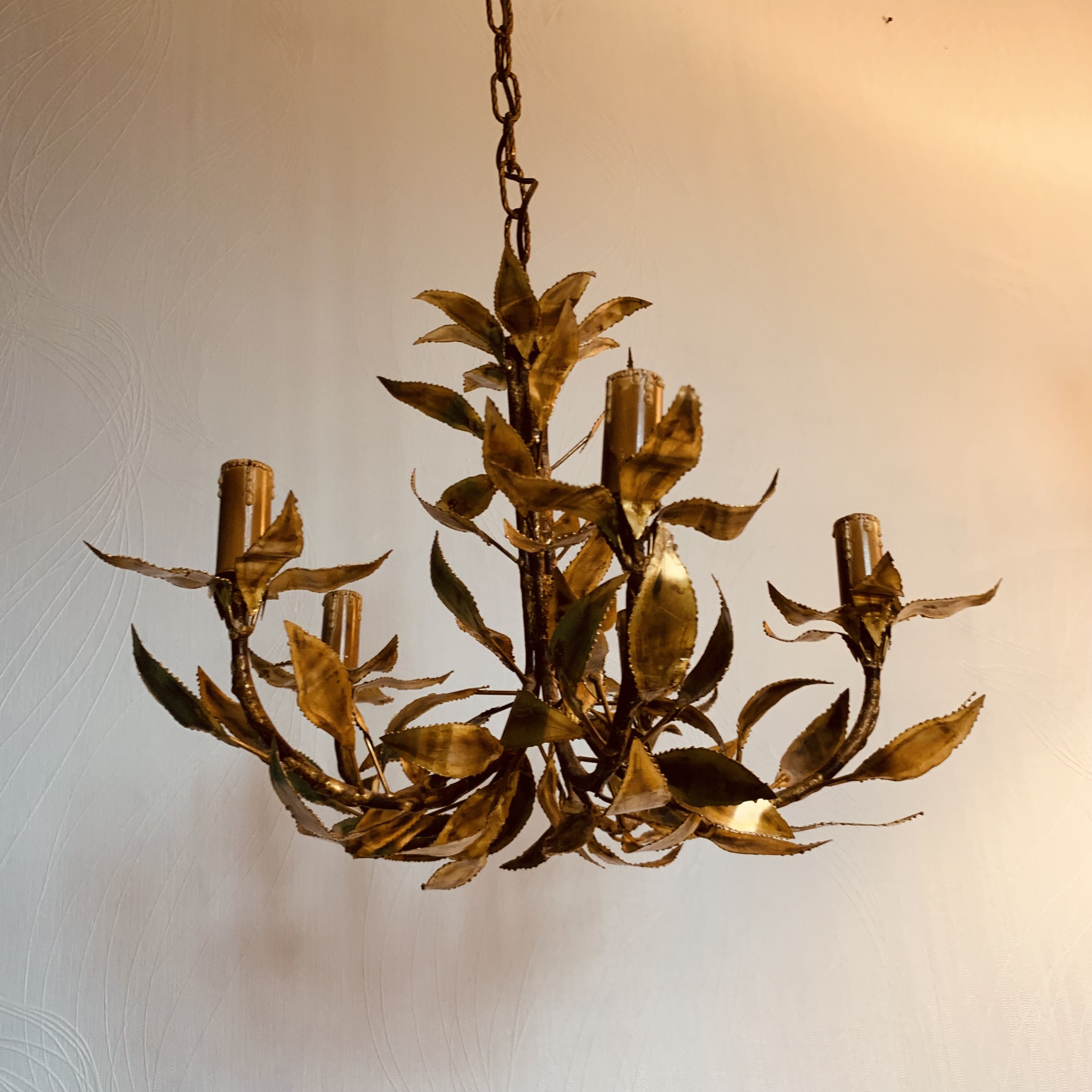 Vintage chandelier foliage decoration