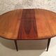 Scandinavian round table in rosewood veneer