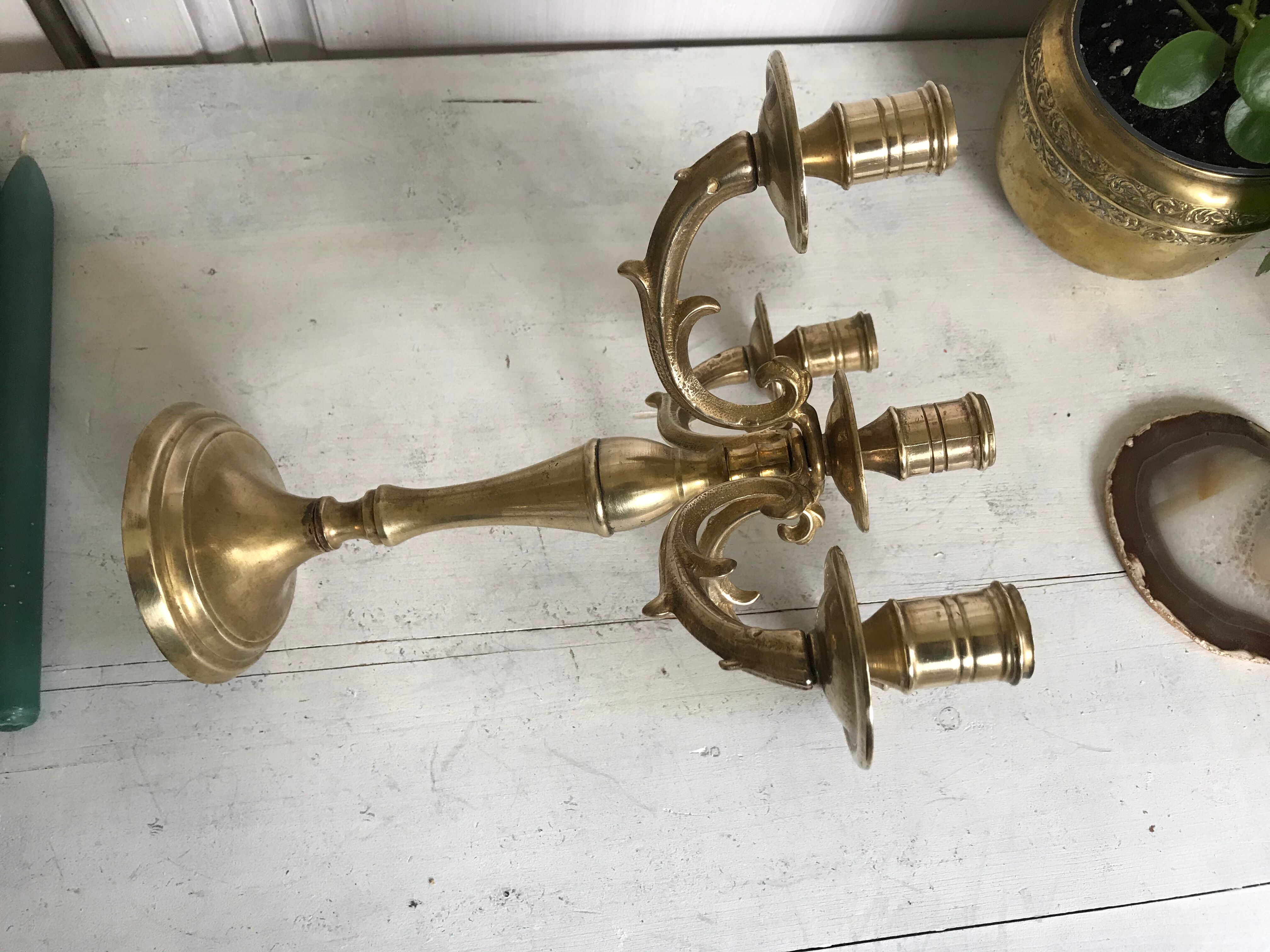 Ancient gilded bronze candlestick