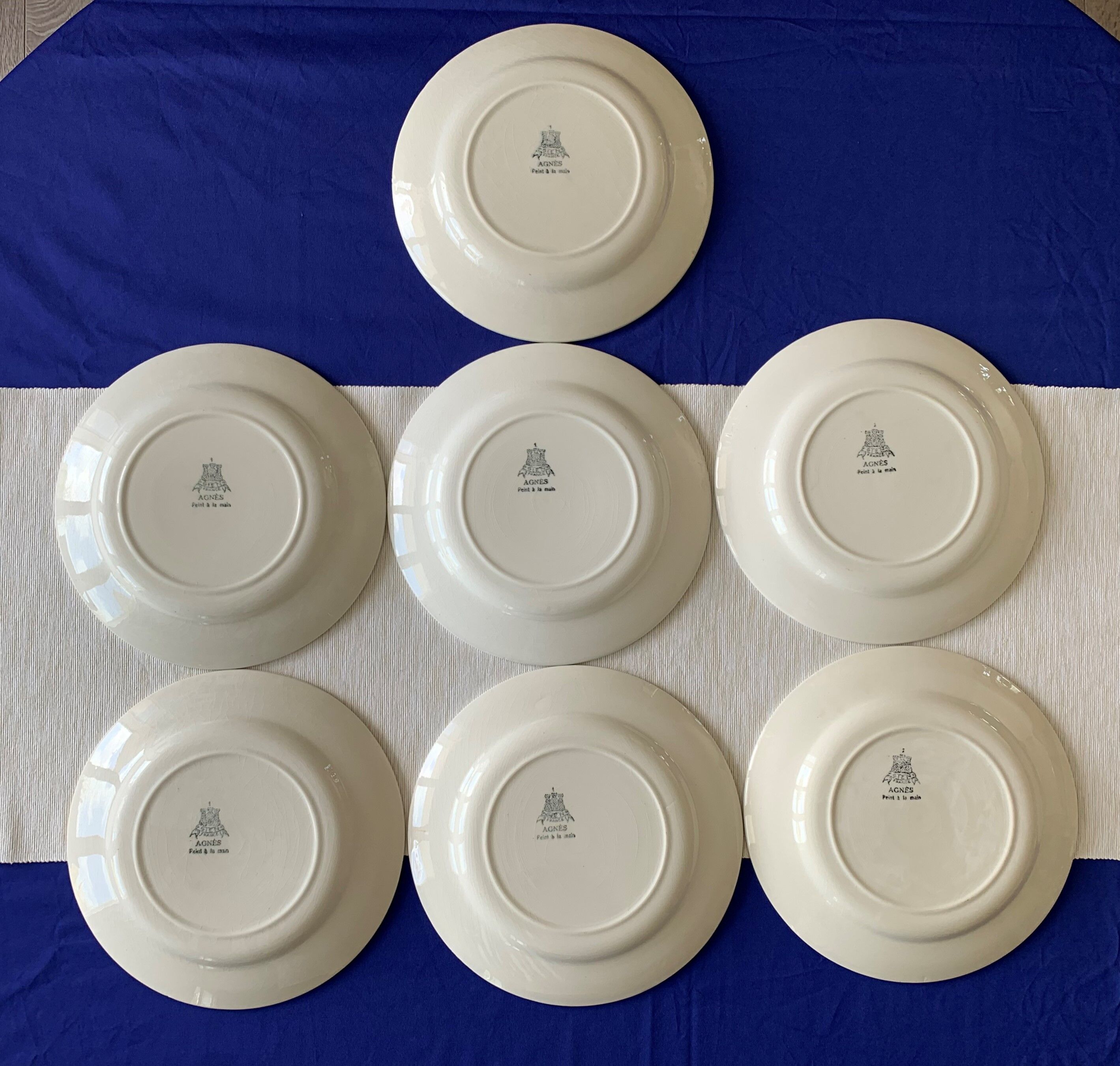 7 flat antique plates in Gien earthenware