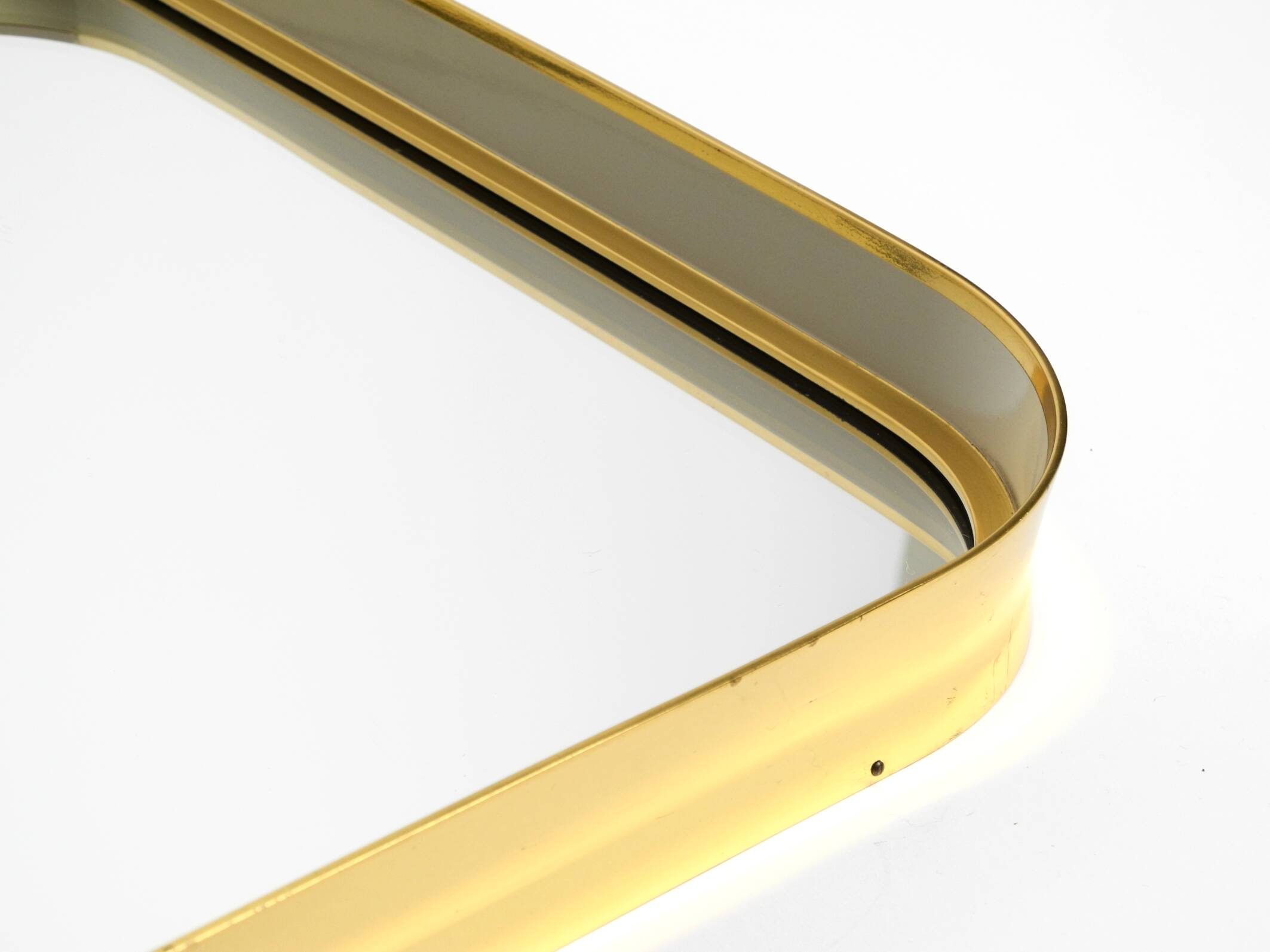 Beautiful original Mid Century Modern "Zier-Form" wall mirror with heavy br