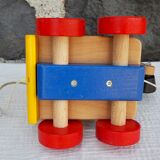Wooden articulated truck toy