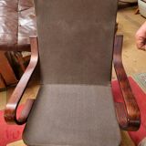 Scandinavian tilting and rotating armchair