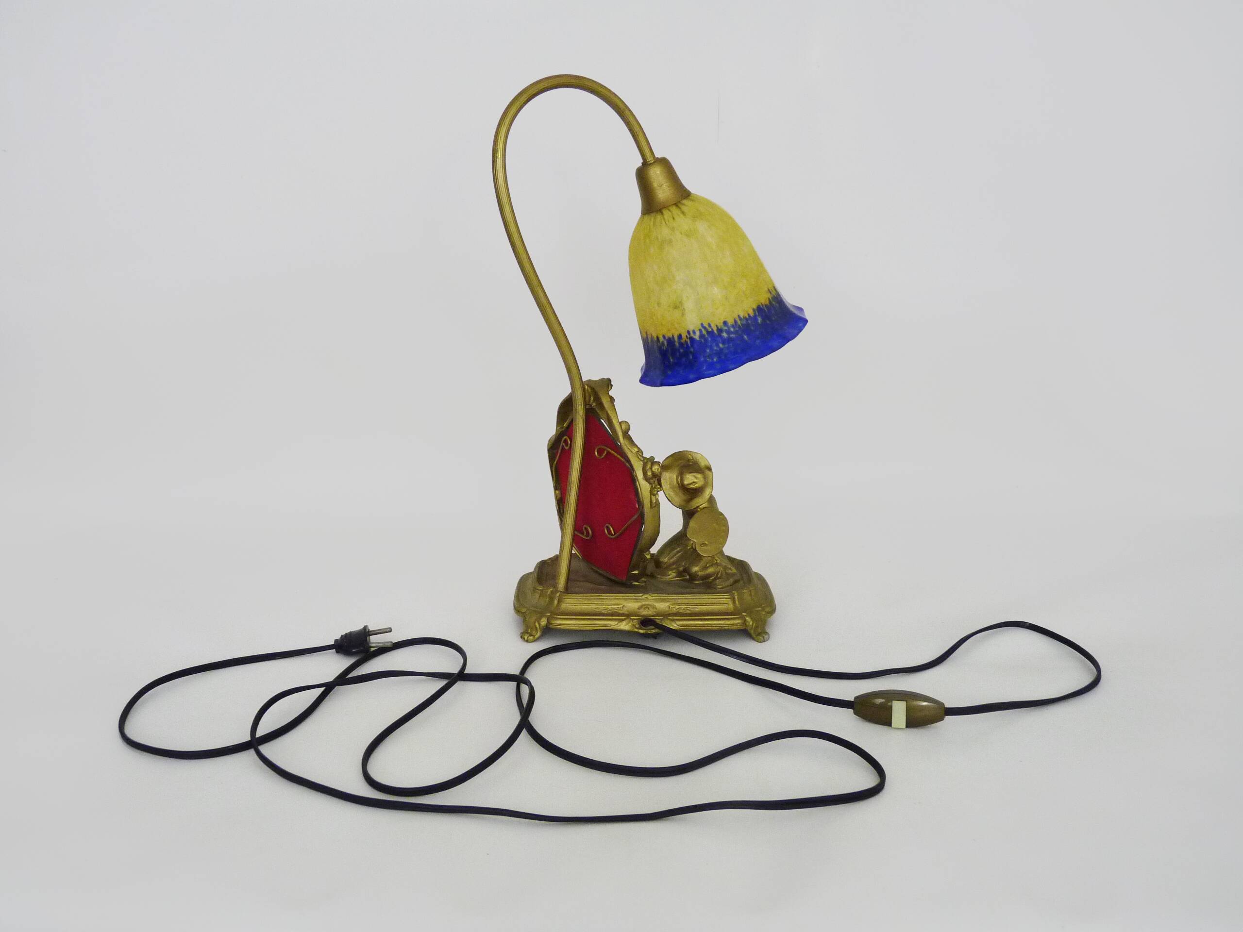 Vintage bronze table lamp featuring a painter on a mirror from the 1960s.