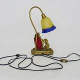 Vintage bronze table lamp featuring a painter on a mirror from the 1960s.