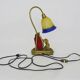Vintage bronze table lamp featuring a painter on a mirror from the 1960s.