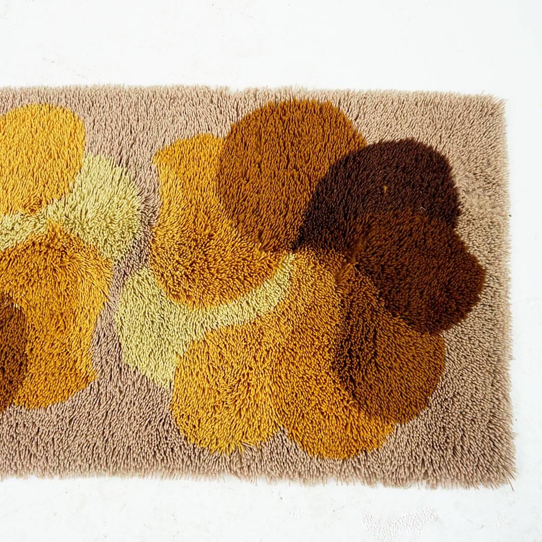 Brown and yellow floral wool carpet by Desso, Netherlands, 1970s.