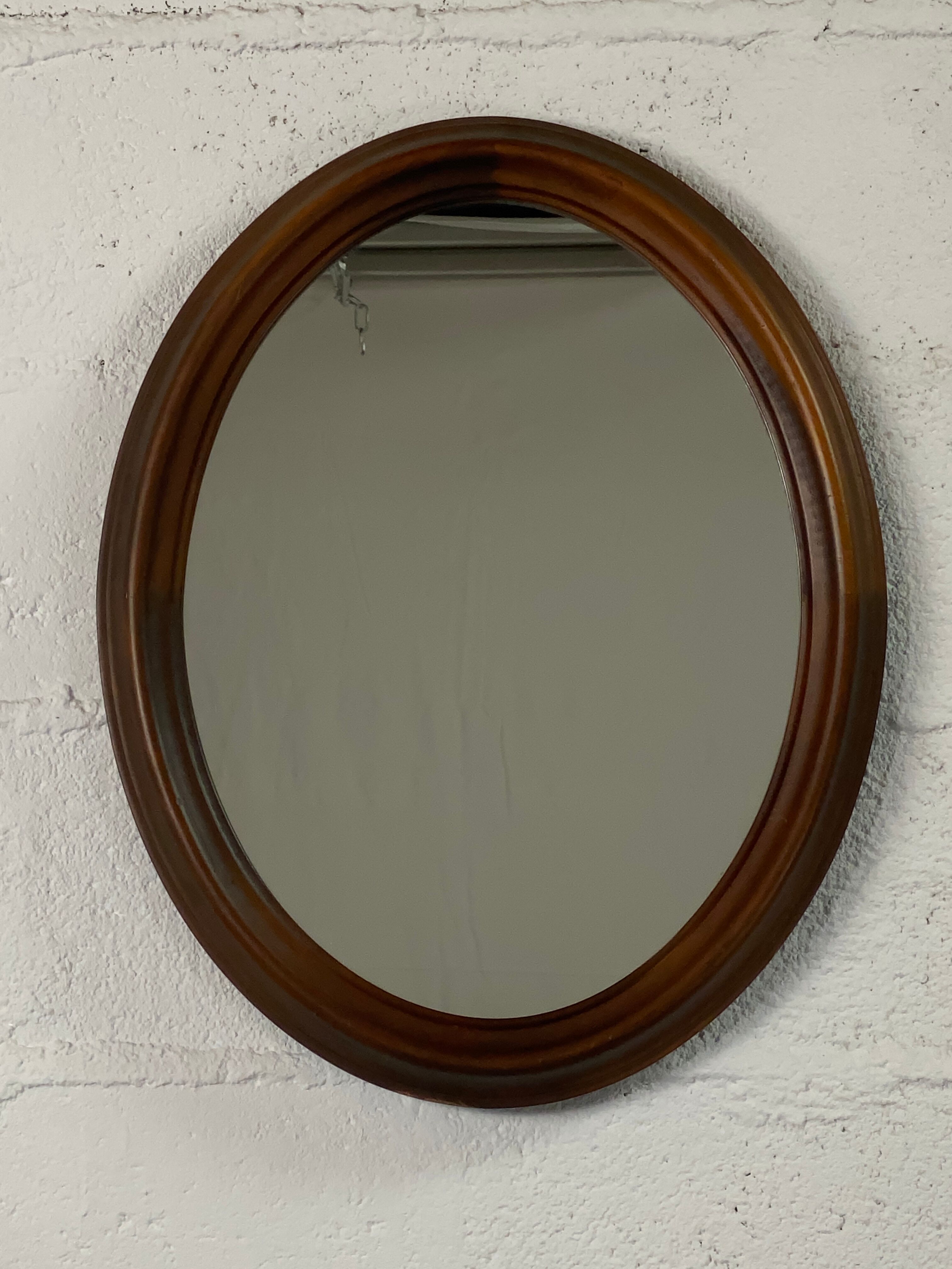 Oval wooden mirror