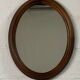 Oval wooden mirror