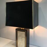 Large lamp in black lacquered wood, gilding and mother-of-pearl. French work. Circa 1970