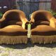 Paire de fauteuils crapauds vintage en velours vert.