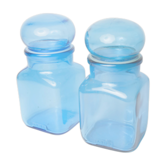 Pair of blue pharmacy bottles Ariel