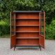 Renovated black antique Louis XVI style display cabinet, glass-fronted bookcase.