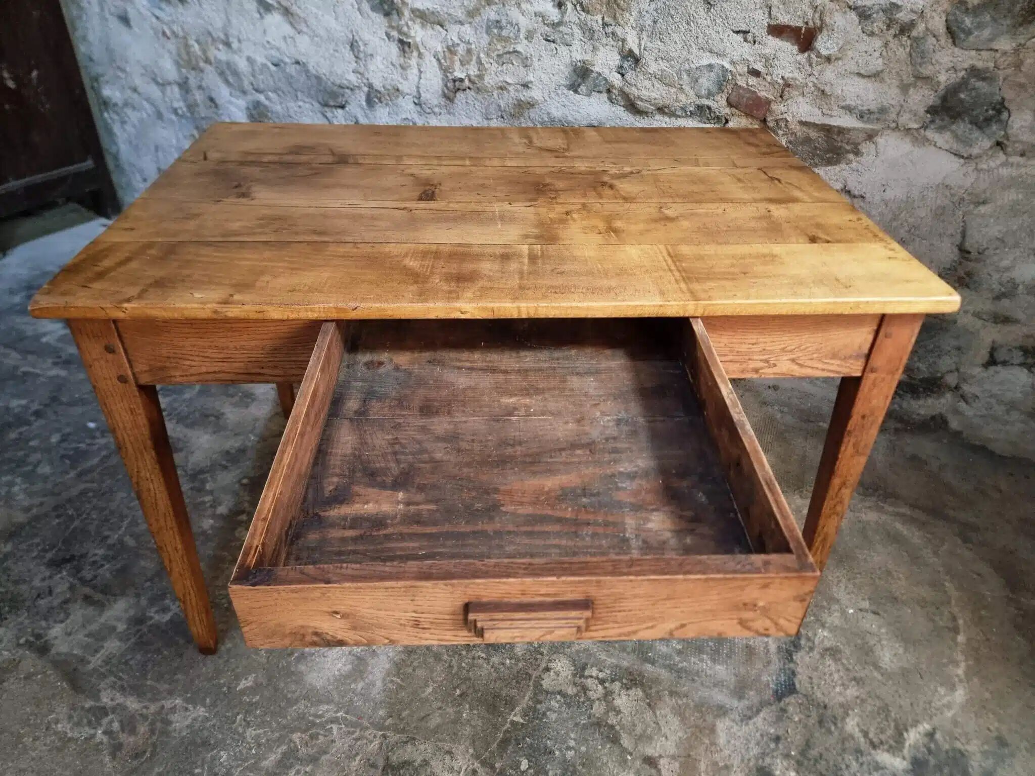 Antique French dining table with drawer, around 1900.