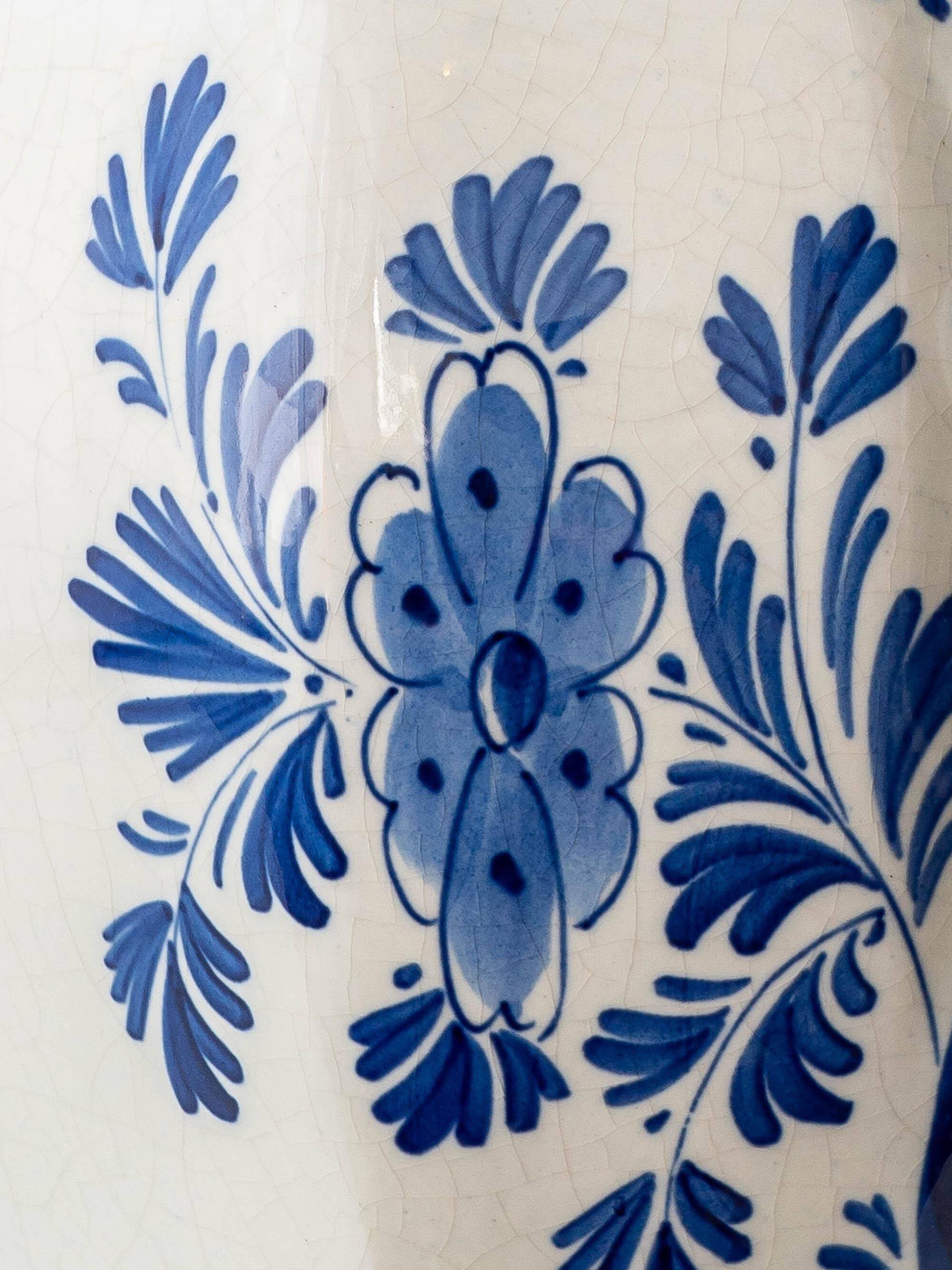 Pair of Royal Delft blue and white ceramic table lamps, 1905, with new pleated silk shades.