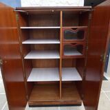 Wardrobe on a plinth in walnut and walnut veneer circa 1940.