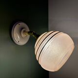 Vintage globe wall light in frosted pink and gold glass.