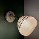 Vintage globe wall light in frosted pink and gold glass.