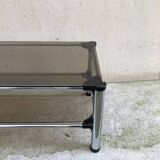 Rectangular tubular coffee table on two levels, smoked glass