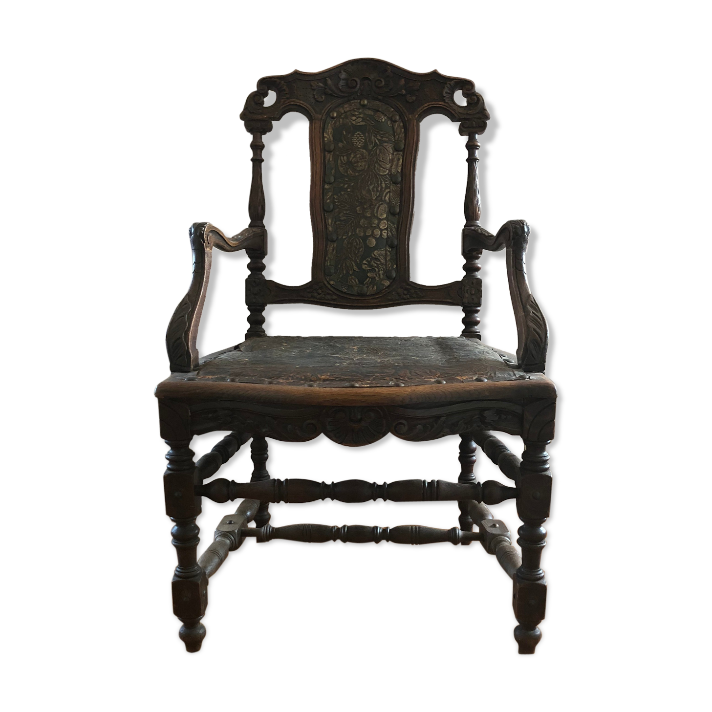 Old carved wooden armchair
