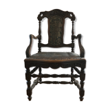 Old carved wooden armchair