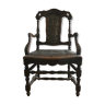 Old carved wooden armchair