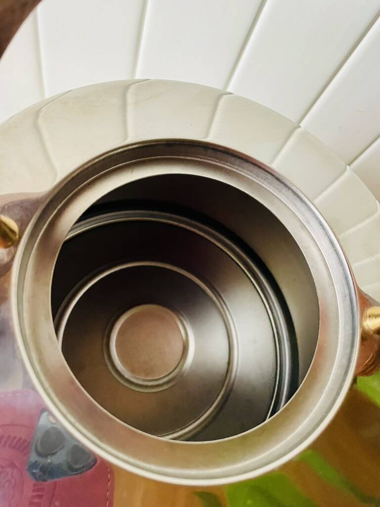 Vintage Bodum Ottoni stainless steel kettle designed by Carsten Jørgensen 1986, button.