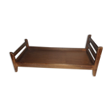 Old wooden doll bed