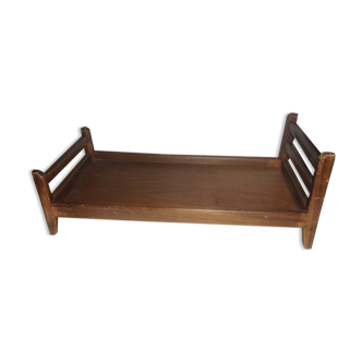 Old wooden doll bed