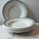 Set of 6 deep plates Saint Amand with floral garland decoration.