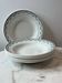 Set of 6 deep plates Saint Amand with floral garland decoration.