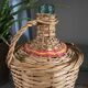 Demijohn dressed in rattan