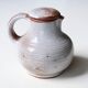 Sandstone milk pitcher by Jeanne and Norbert Pierlot, 60s