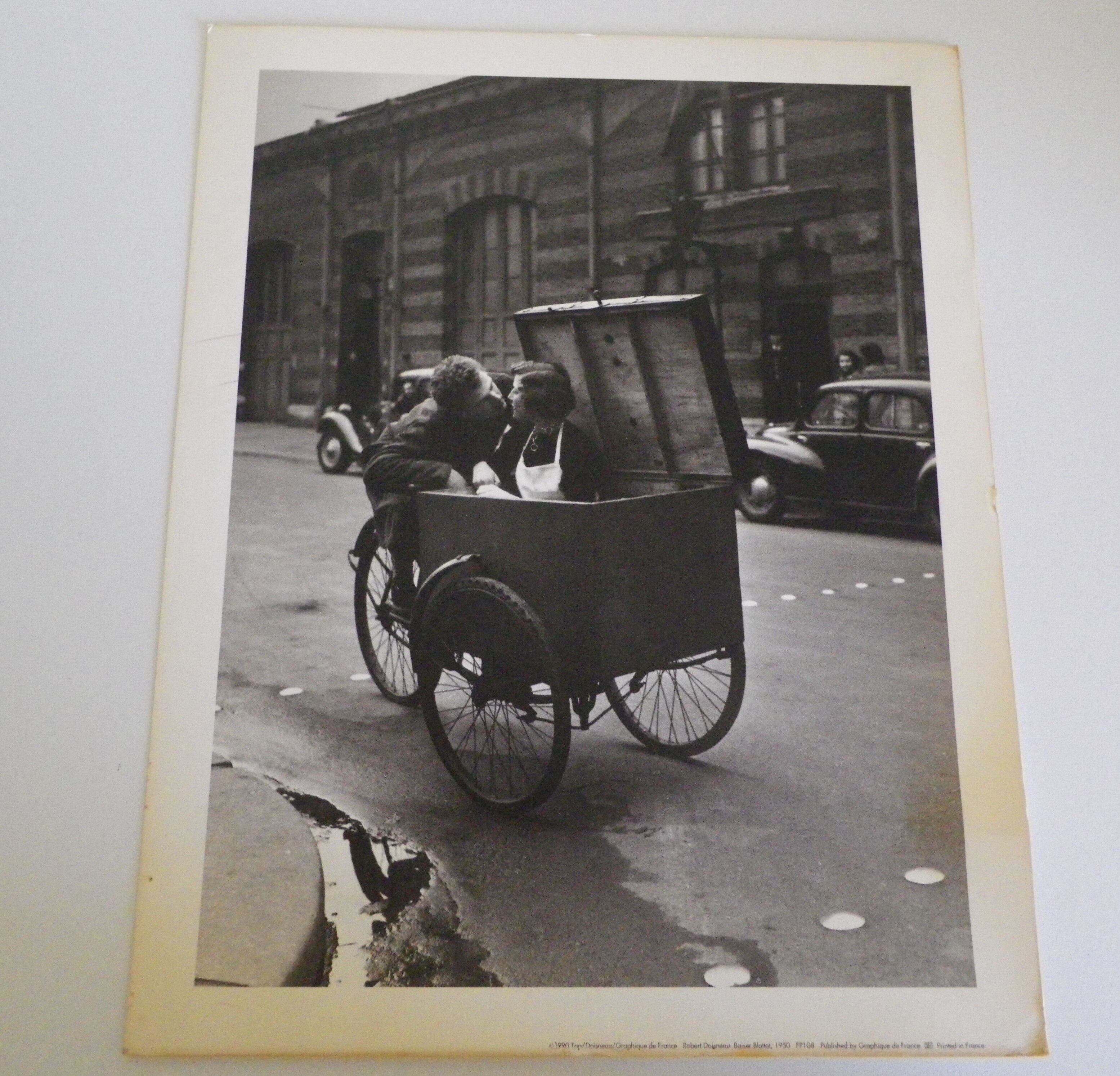 Robert Doisneau's black and white poster "Kiss Blottot" from 1950
