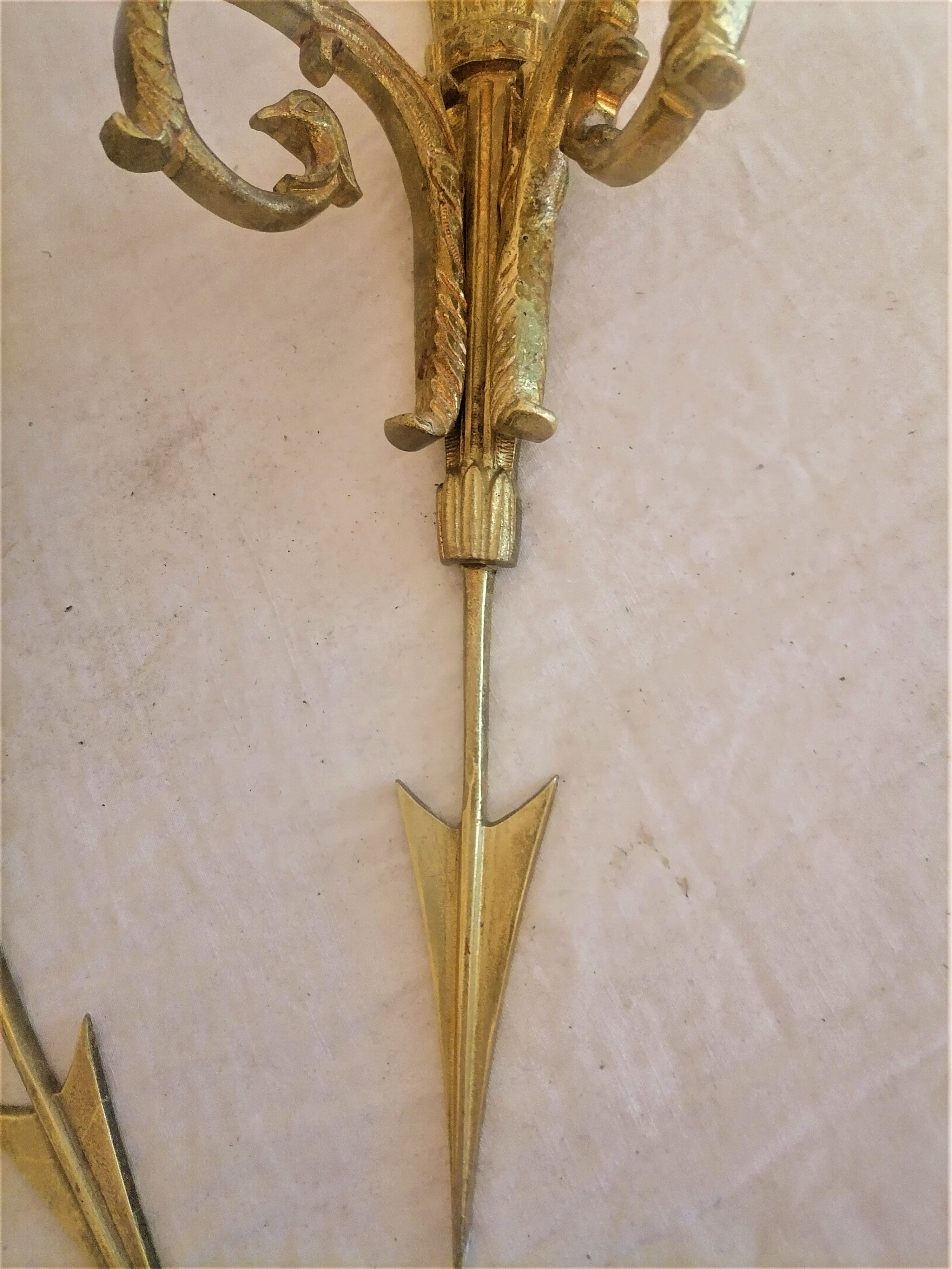 Ancienne paire d'appliques en bronze doré de style empire