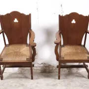 Pair of brutalist oak lounge chairs with rush seats – Netherlands