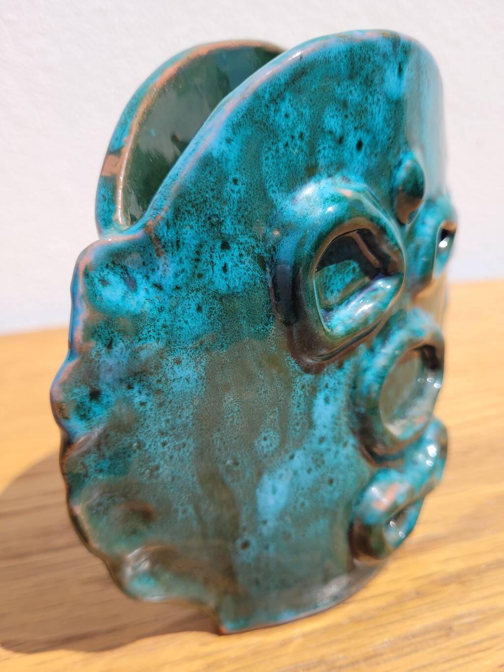 Turquoise glazed terracotta ceramic vase