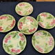 Set of six old slurry dessert plates