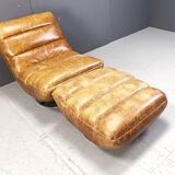 Vintage leather swivel chair with stool, 1970s